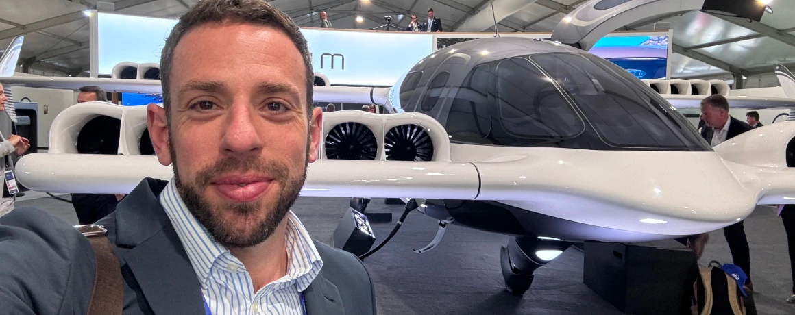 Dan Weil in front of an aircraft